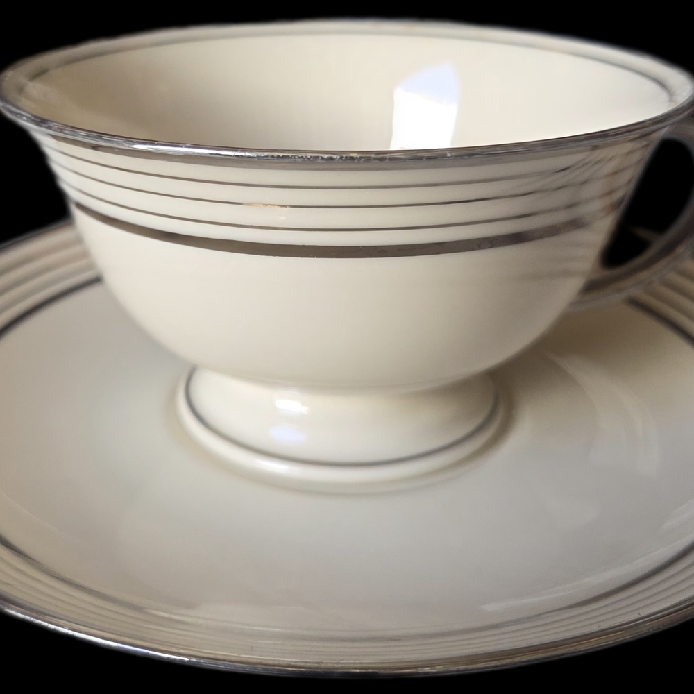 Elegant Cream and Silver Teacup and Saucer Set